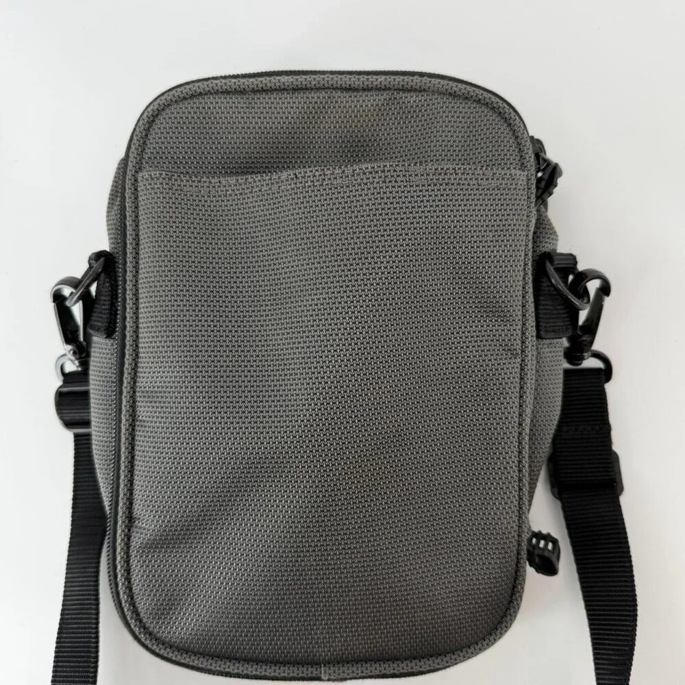 Tumi leather canvas